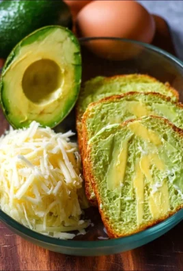 Homemade 3-Ingredient Avocado Bread on a wooden cutting board.