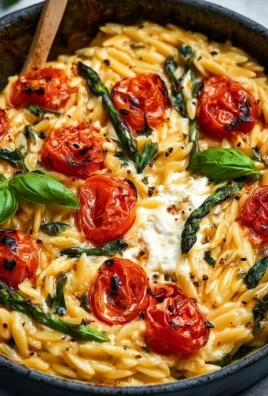 Creamy Baked Feta Orzo dish with cheese and vegetables