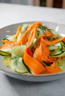 Carrot and cucumber ribbon salad with fresh herbs and light dressing