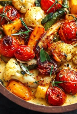 Cheesy Marry Me Roasted Vegetable Medley featuring colorful assorted roasted veggies