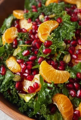 Colorful Citrus Pomegranate Kale Salad with fresh ingredients