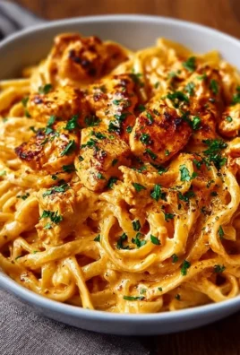 Delicious Cowboy Butter Chicken Pasta served in a bowl with herbs