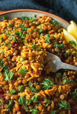 Plate of Easy Mediterranean Lentils and Rice garnished with herbs