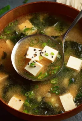 Bowl of easy gluten-free miso soup with tofu and green onions