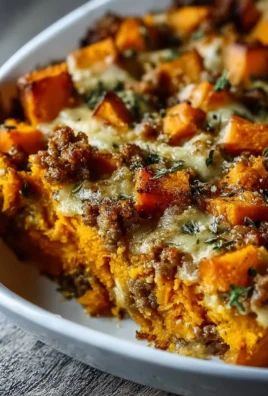 Ground Turkey Sweet Potato Casserole topped with marshmallows and pecans