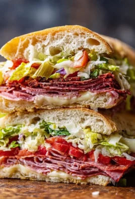 Delicious Italian Grinder Salad Sandwich with fresh vegetables and meats