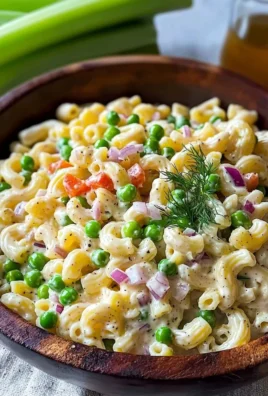 Fresh macaroni salad recipe without mayo, ideal for summer picnics and parties.