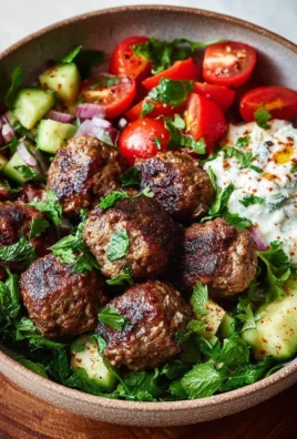 Delicious Mediterranean Meatballs Bowl with fresh ingredients and herbs