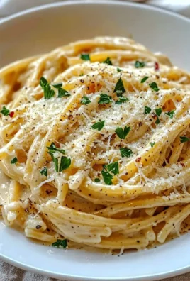 One Pot Creamy Garlic Pasta with herbs and cheese in a bowl