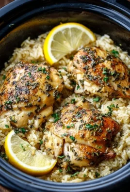 Slow Cooker Lemon Herb Chicken served with rice in a bowl