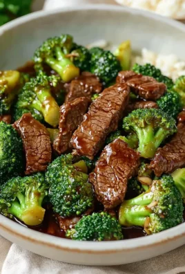 Beef and broccoli stir-fry served in a bowl with vibrant vegetables