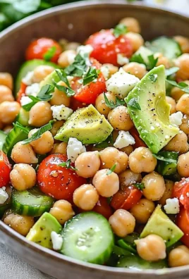 Colorful chickpea salad with vegetables in a bowl