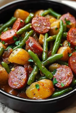 Crockpot Kielbasa with green beans dish ready to serve