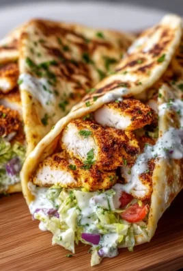 High-protein crispy cottage cheese flatbread chicken wraps on a plate