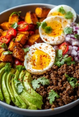 Delicious high protein ground beef power bowls with fresh vegetables and grains.