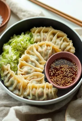Plate of freshly made homemade dumplings ready to be served