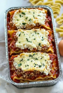 Mini Freezer Healthy Lasagna topped with fresh basil and mozzarella cheese