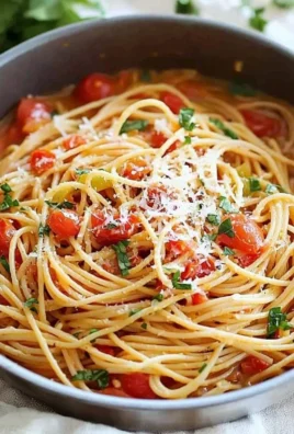 Delicious One Pot Pasta dish served in a bowl with fresh herbs.