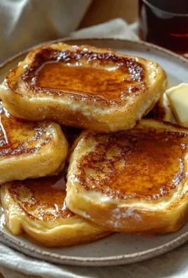 Delicious Overnight Crème Brûlée French Toast topped with caramelized sugar