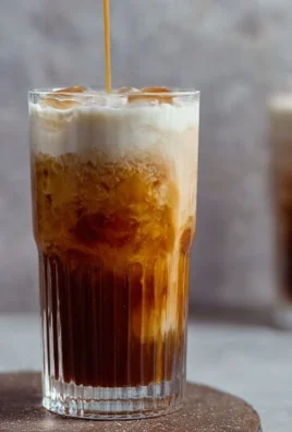 Delicious Salted Caramel Cream Cold Brew in a glass with whipped cream
