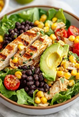 Colorful Southwest Chicken Salad with grilled chicken, fresh veggies, and dressing
