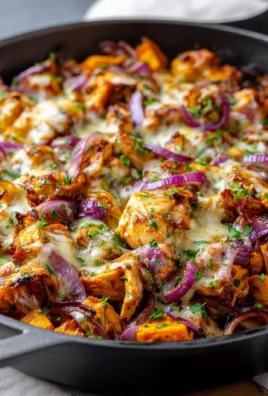 BBQ chicken sweet potato skillet in a cast iron pan