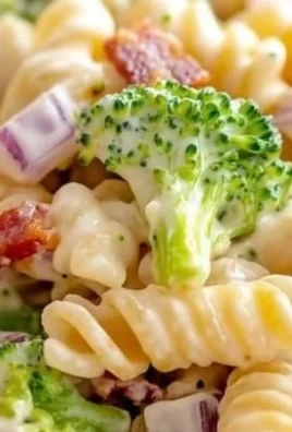 Delicious broccoli pasta salad with fresh vegetables and dressing