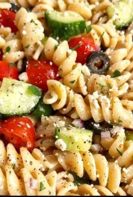 Colorful and fresh best pasta salad with vegetables in a bowl