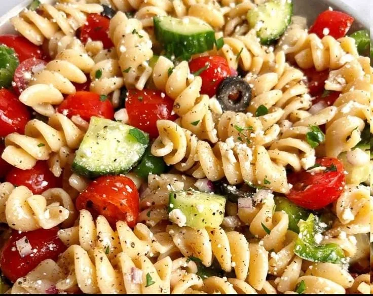 Colorful and fresh best pasta salad with vegetables in a bowl