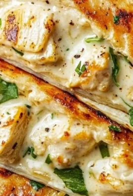 Delicious cheesy garlic chicken wraps on a plate