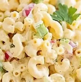 Classic macaroni salad served in a bowl, perfect summer side dish