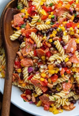 Colorful Cowboy Caviar Pasta Salad with beans and fresh vegetables