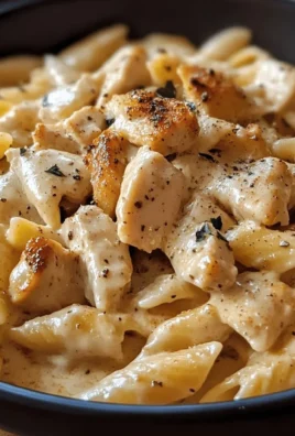 Creamy Cajun Chicken Pasta served in a bowl with creamy sauce and spices