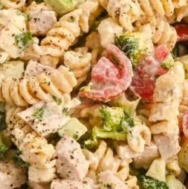 Creamy high-protein pasta salad with chicken and fresh vegetables