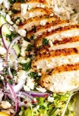 Healthy Greek Chicken Bowls with fresh vegetables and flavorful seasonings