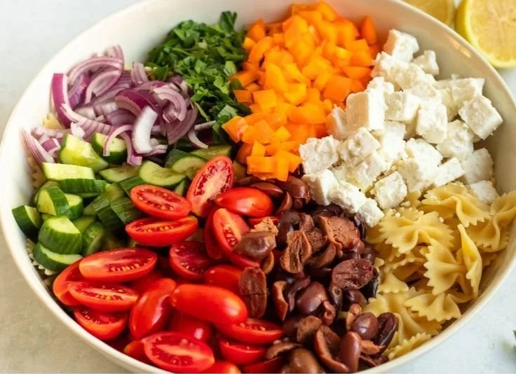 Delicious Greek Pasta Salad with olives, feta cheese and fresh vegetables