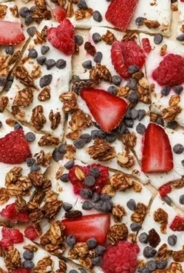 Healthy Greek Yogurt Bark topped with fruits and nuts