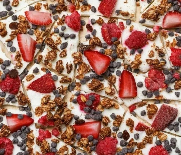Healthy Greek Yogurt Bark topped with fruits and nuts