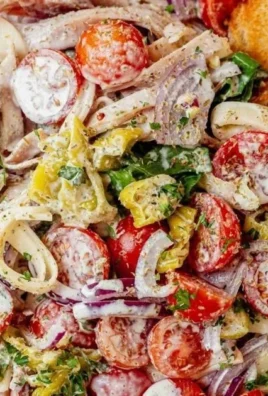 Delicious and colorful Grinder Salad with fresh vegetables and toppings.