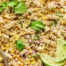 High protein street corn pasta salad with colorful vegetables and creamy dressing