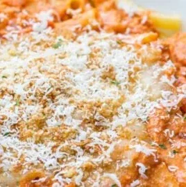 Delicious Five Cheese Ziti Al Forno served in a dish, inspired by Olive Garden's recipe.