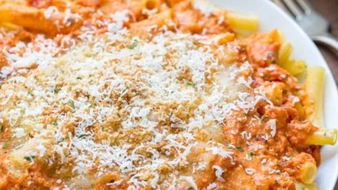 Delicious Five Cheese Ziti Al Forno served in a dish, inspired by Olive Garden's recipe.