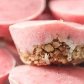 Skinny Frozen Strawberry Bites served in a bowl, perfect for a healthy snack.