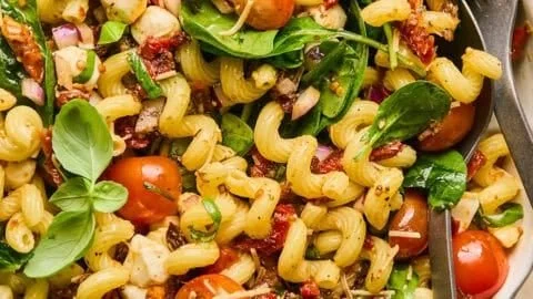 Sun Dried Tomato Pasta Salad with vibrant ingredients in a bowl