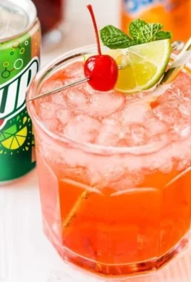 A refreshing 4-ingredient mocktail served in a glass with garnishes.