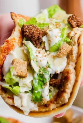 Delicious Chicken Caesar Tacos served with fresh toppings
