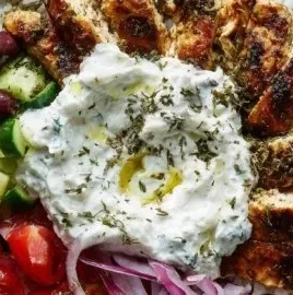 Chicken gyro bowls with fluffy rice and creamy tzatziki sauce
