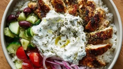 Chicken gyro bowls with fluffy rice and creamy tzatziki sauce
