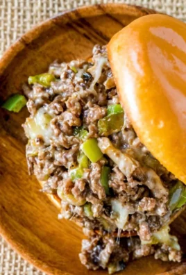 Gordon Ramsay's delicious Philly Cheesesteak Sloppy Joes served with fresh toppings