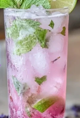 Lavender Mojito Mocktail garnished with fresh mint and lavender sprigs